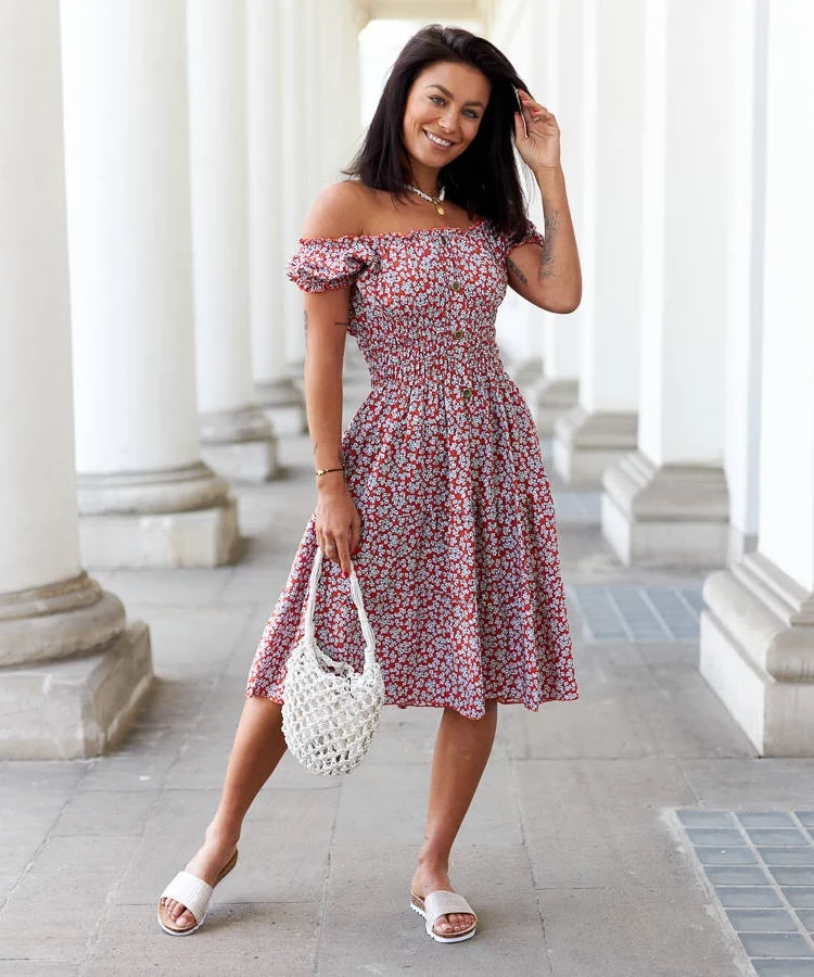 Pomarańczowa sukienka midi w kwiatki Sauro