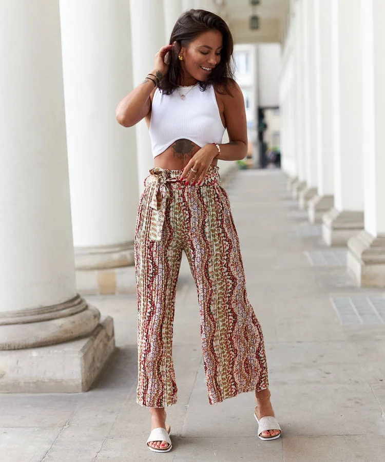 Białe szerokie plisowane spodnie Archimede