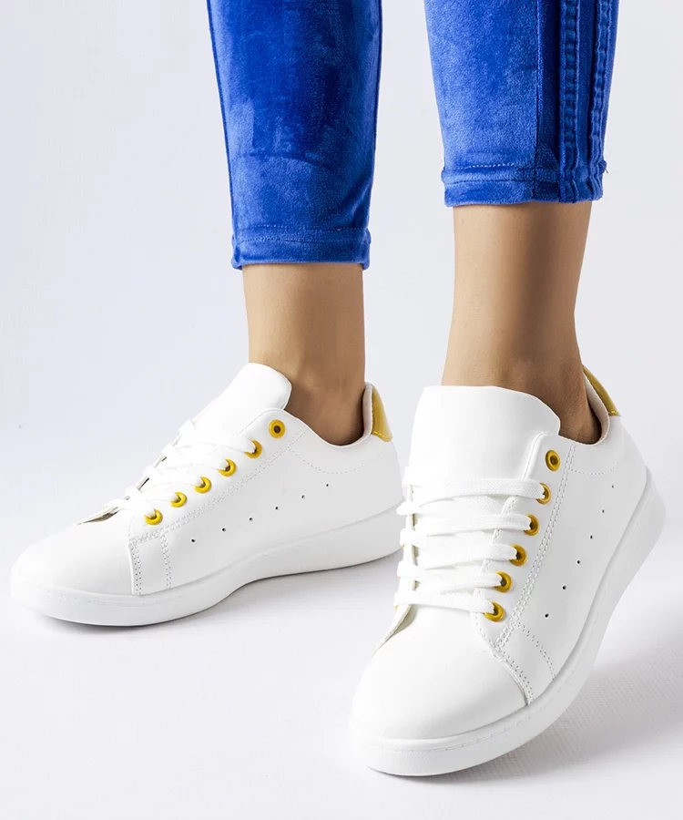 Białe tenisówki z żółtymi akcentami Bushnell