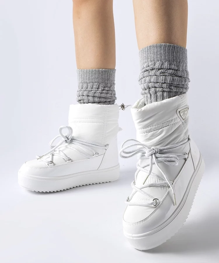 Białe ocieplane śniegowce z gumką Oslavia