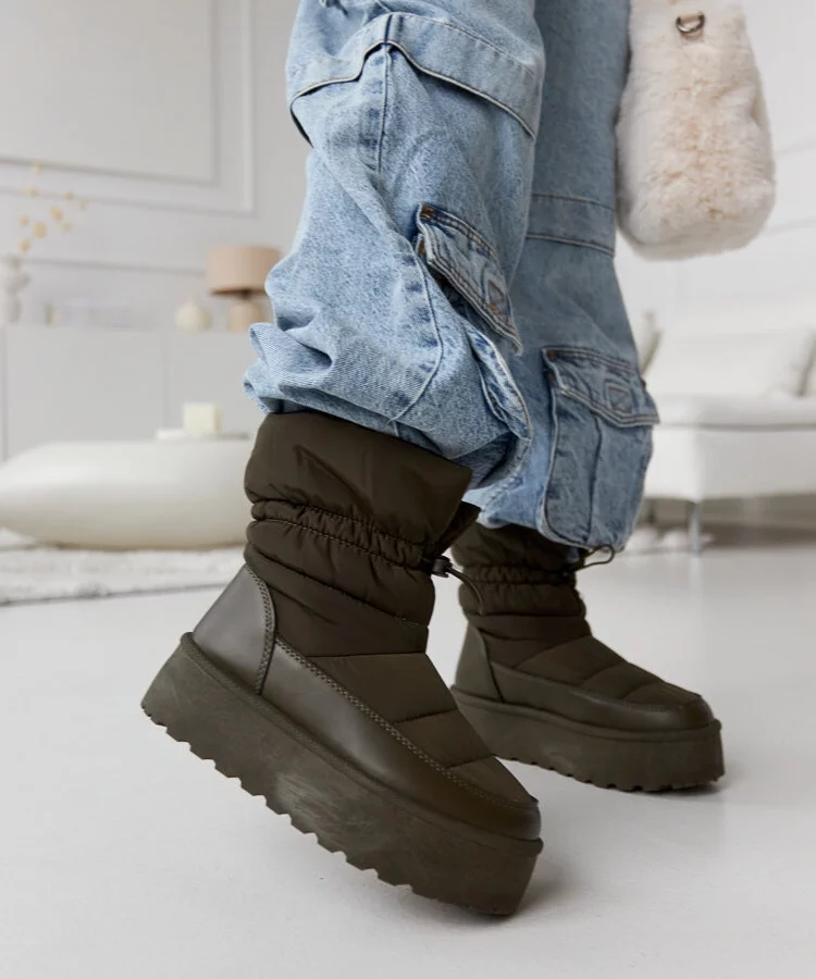 Zielone ocieplane śniegowce na platformie Polk