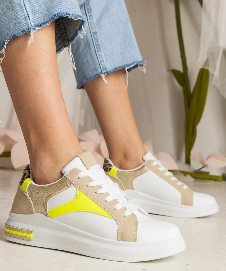 Białe sneakersy damskie z dodatkiem brokatu i panterki Wellos