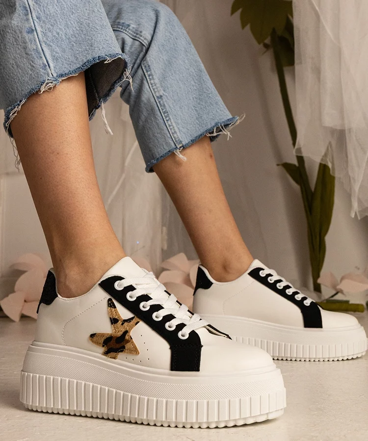 Biało-czarne sneakersy zdobione brokatem i gwiazdką Taleda