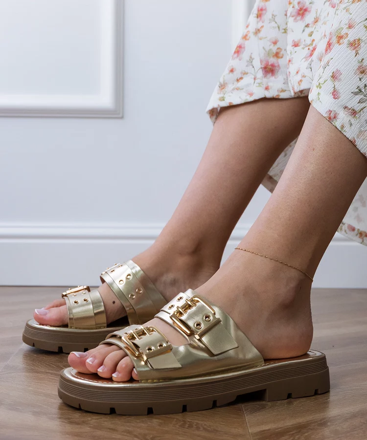 Złote klapki płaskie z klamrami na paskach Liluna