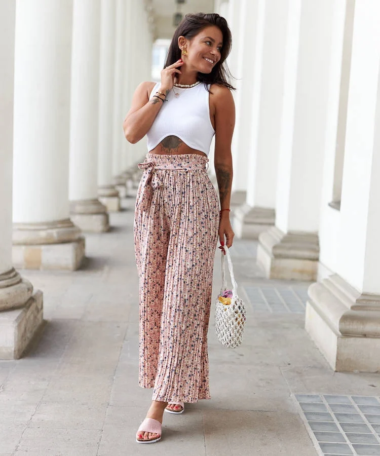 Różowe szerokie plisowane spodnie Pietro