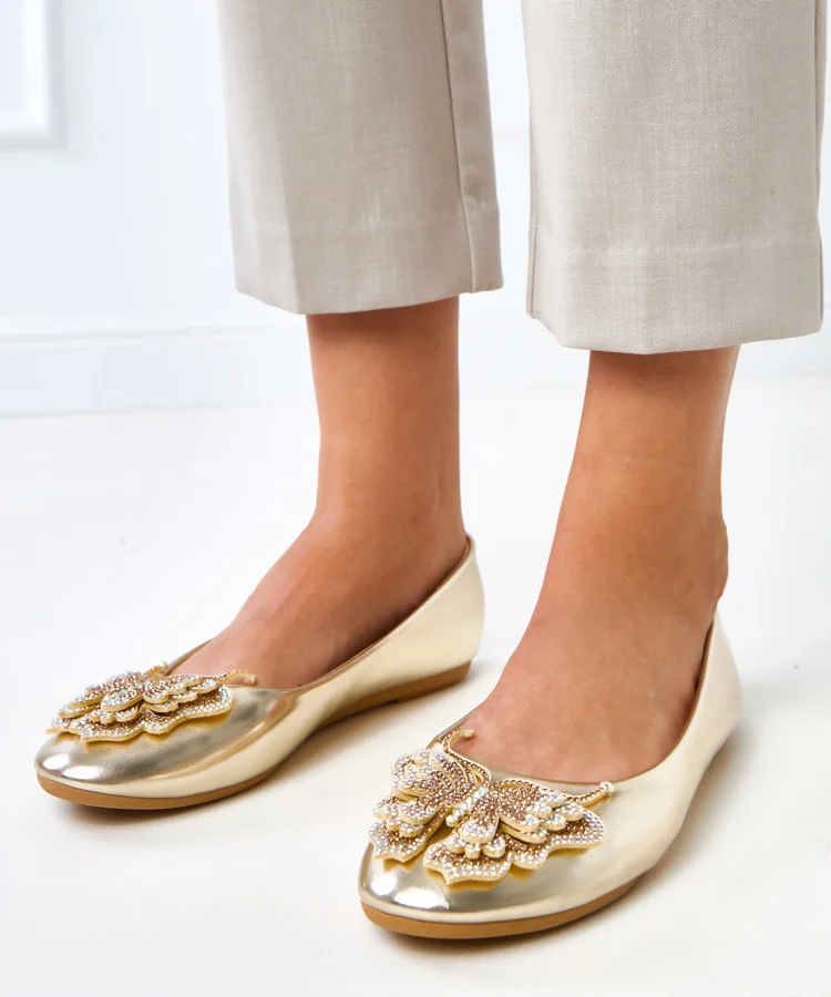 Złote balerinki z ozdobnym motylem Gruca