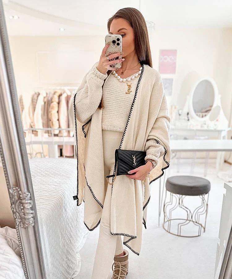 Beżowe ponczo z obszyciem Levi